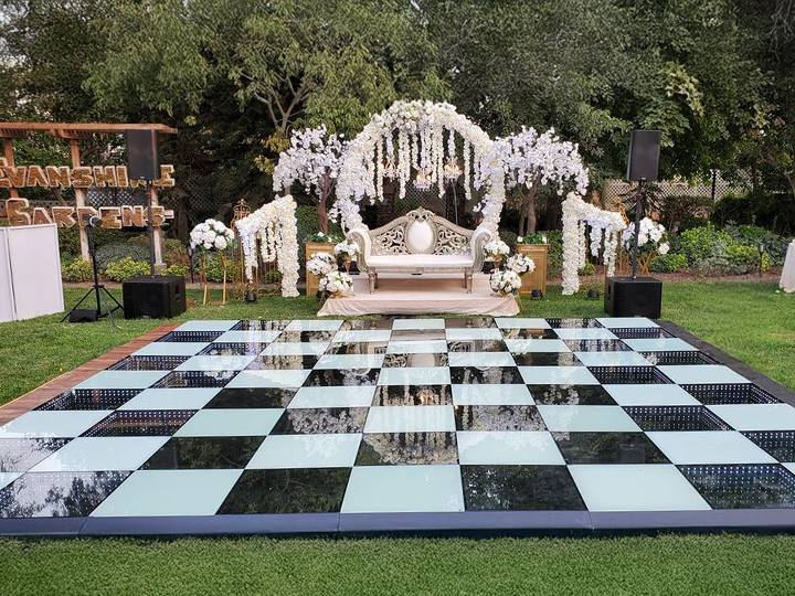 A-professional-dance-floor-with-a-subfloor-for-an-outdoor-wedding.